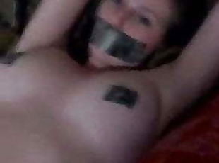 Duct Tape Gagged on Bed