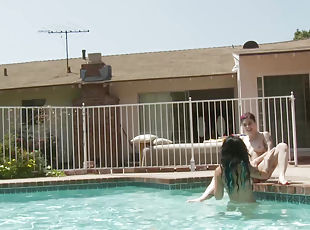 Britanny Lynn and Joanna Angel tease each other in the pool