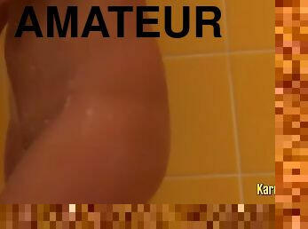 Curvy amateur chick filmed at shower