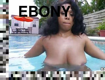 Ebony teen katt garcia shows her nice big tits in the pool