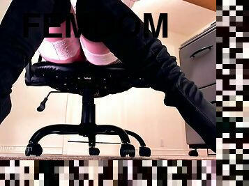 Femdom has a slave locked under her desk