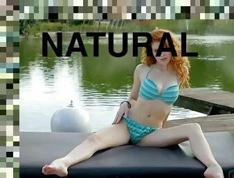 Naturally curved redhead beauty strips off her bikini