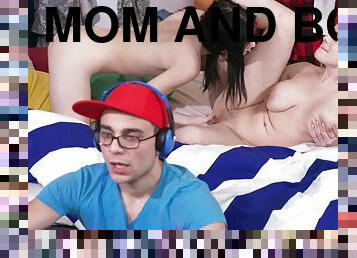 A mom and a girlfriend get naughty and fuck behind the son's back