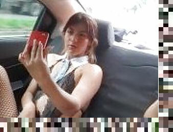 Naughty college girls touch each other in an uber on the go.