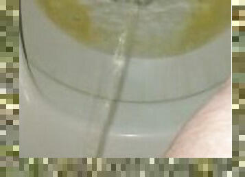 Good morning close up piss and toilet water view