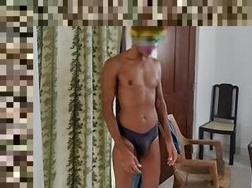 Sri Lankan Hot boy undressing to watch gay porn and cum