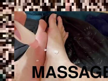 Massaging lotion on my big ass size 13  feet