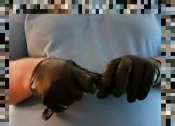 Handcuffs and leather cop gloves