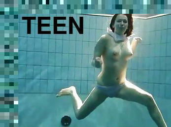Teen swims in panties and looks cute