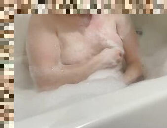 Curvy white girl takes a bubbly bath