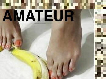 Cute tiny feet stroke, peel and crush a banana - MandySnow free clip