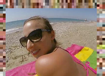 Amirah adara wearing pink bikini poses on the beach