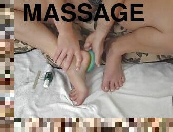 Female Fitness Instructor Grooms Feet