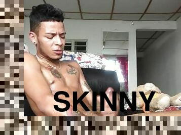 Skinny inked Latino strips undies and masturbates in solo