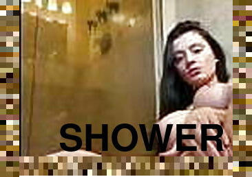 white babe plays in the shower