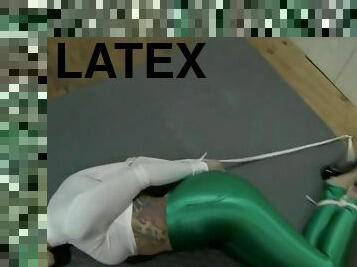 Johannie in green spandex bound and wrap gagged