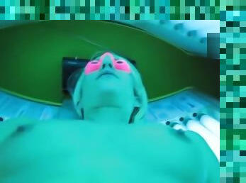 Blonde amateur masturbating at tanning salon