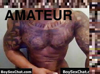 Muscular and tattooed dude wanking with his little cock