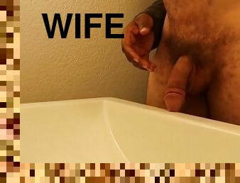 Wife aims his dick to pee in hotel sink