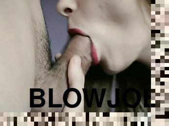 Beautiful blonde gives a deep blowjob close up
