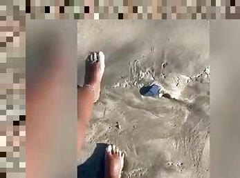 Sandy Feet On The Beach