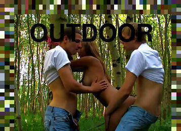 Teen enjoys rough outdoor threesome
