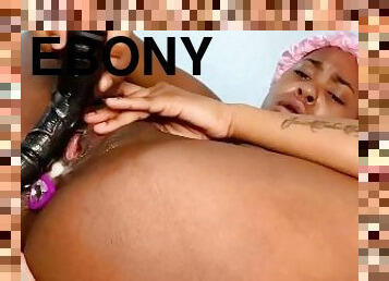 Ebony Babe Fucks Her Wet Gripping Pussy