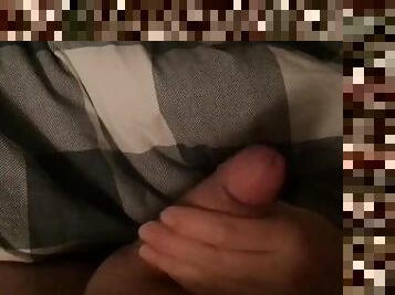 Casual handjob while wife watches tv on smartphone