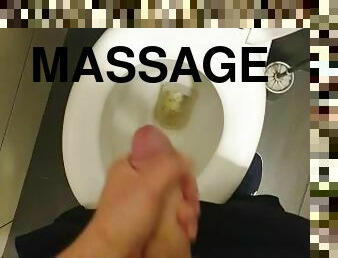 Young man masturbatets in bathroom.