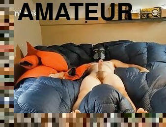 Down Jacket Puffy Fetish Guy Fucks His Orange Parka on Bed of Soft Shiny Nylon. Cums on parka.