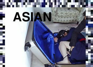 Asian Ziptied Left In Suitcase