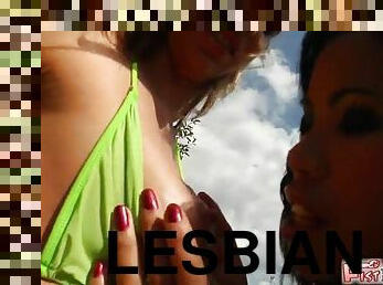 Lesbian babes please one another as they fist one another