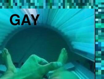 Stroking in tanning bed