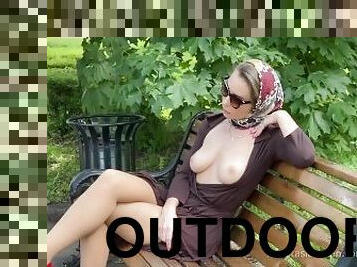 Stylish topless lady outdoors