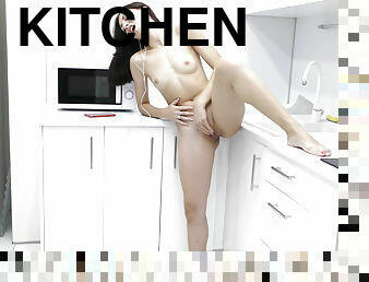 Horny Danaa fucks her pussy in the kitchen solo