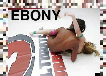 Ebony wrestling lez dominates over loser with strapon