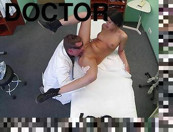 Slender brunette getting screwed in doctor's office