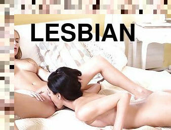 Lesbians Aislin & Arian Joy gently licks pussies on the bed