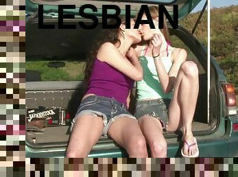 Girls Out West - Slender lesbians licking assholes