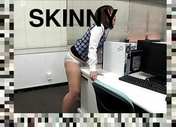Skinny Asian babe masturbates in the office