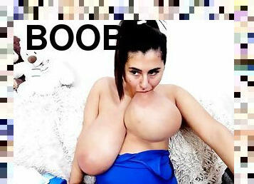 Monster boobs on webcam! Brunette girl next door teasing topless