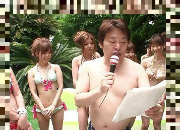 Bunch of Japanese young girls in sexy bikinis have some fun outside