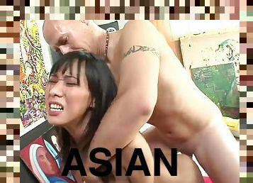 Asian whore rides on a hard dick