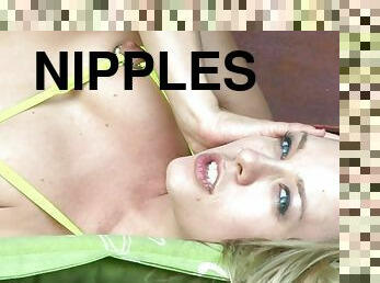 Blonde girl with huge nipples spreads her legs open