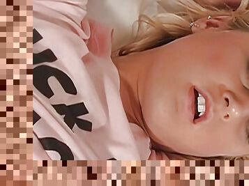 Blonde rubs her shaved slit with fingers before stripping