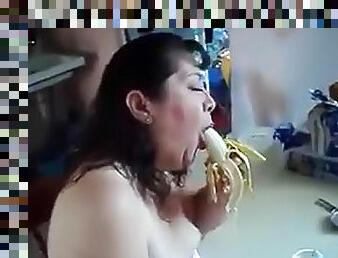 Big girl eats banana naughty style