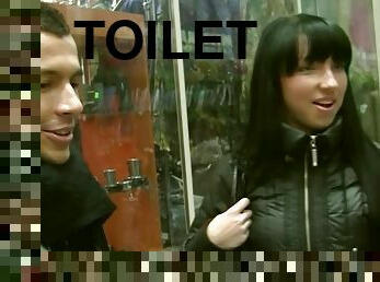 Brunette gal gets fucked in the toilet