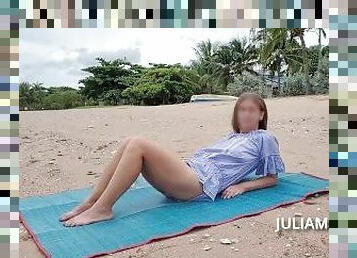 Bottomless girl on a deserted public beach
