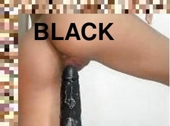 18 years old riding black dildo until it comes