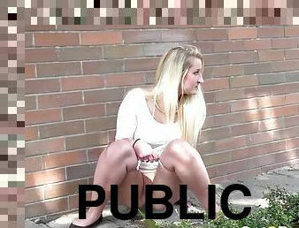 Pretty white lace dress on a chick peeing in public